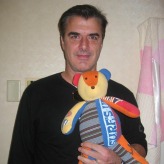 Chris Noth with a Patchwork Bear Baby clothes bear